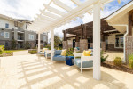 Cozy outdoor seating area with stylish furniture in a premier apartment community in Hammond.