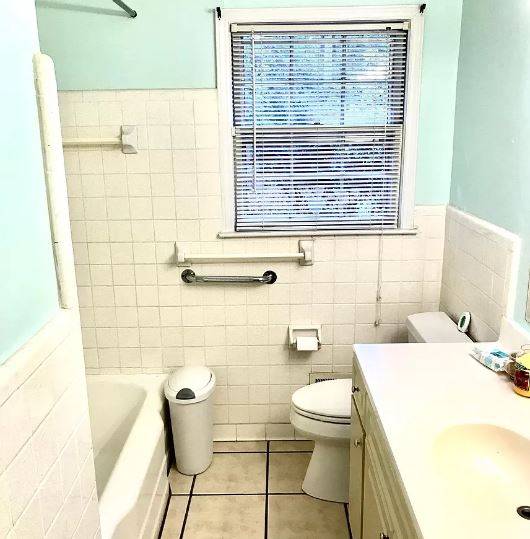 Welcome Home, hardwood flooring in two bedrooms and vinyl in one BR.