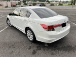 2012 Honda Accord LX-P in white color, parked, showcasing its sleek design and aluminum alloy wheels.
