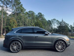 2019 Porsche Cayenne S AWD in Mahogany Metallic color parked in a scenic environment