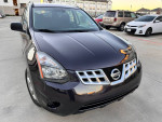 Front view of a Nissan SUV with low mileage, showcasing clean design and excellent condition.