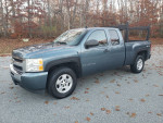 2009 Chevrolet Silverado 1500 LT 4WD Extended Cab in good condition with low mileage and new tow hitch.