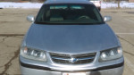 2001 Chevrolet Impala with 185k miles, silver metallic, well-maintained, reliable everyday car for sale.