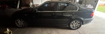 2002 BMW 3 Series 330xi AWD parked indoors with new CV axles and maintenance in progress