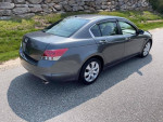 Gray Honda Accord EXL FWD parked on a road, highlighting its sleek design and clean exterior.
