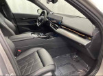 Interior view of 2017 BMW 6 Series 640i xDrive showing leather seats, sleek dashboard, and modern tech features.
