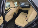 Interior view of 2016 Lexus NX 200t F SPORT showing back seats with beige leather upholstery
