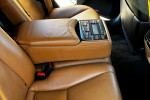Interior view of 2013 Lexus LS 460 L with leather seats and control panel.