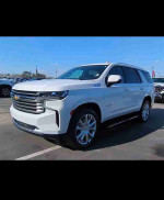 2021 Chevrolet Tahoe High Country in white, showcasing luxury features and spacious interior for families.