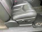 Black leather seat inside a 2003 Chevrolet Silverado 1500 SS, showcasing comfort and sporty design.