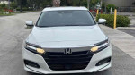 Front view of a 2018 Honda Accord EX-L, a stylish midsize sedan with a spacious interior and advanced safety features.