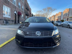 Front view of a 2013 Volkswagen CC R-Line FWD sedan, showcasing its sleek design.