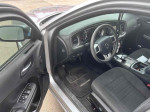 Interior view of a 2014 Dodge Charger R/T showcasing clean seats and dashboard features
