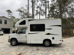 2012 Thor Motor Coach Majestic 19G RV parked in driveway, featuring fresh paint and new tires.