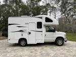 2012 Thor Motor Coach Majestic 19G RV parked in a scenic area with fresh paint and new tires.