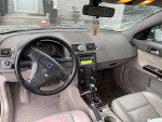 Interior view of a 2007 Volvo S40 2.4i with leather seats and damaged dashboard.