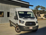 White insulated Ford T250 delivery van with reliable performance for transporting goods and equipment