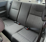 Backseat of a 2008 Ford Focus SE in excellent condition with charcoal cloth interior.