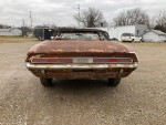 1970 Dodge Challenger convertible rear view, in need of restoration, showing wear and rust.