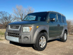 2003 Honda Element in green, clean condition with 109,000 miles, garage kept, reliable SUV for sale.