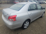 Silver 2009 Toyota Yaris parked, showcasing pristine condition and stylish design for sale.