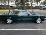 1996 Jaguar XJR in beautiful condition, showcasing a well-maintained dark green exterior.