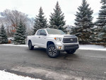 2019 Toyota Tundra 4x4 in snowy landscape, one owner, clean title, well serviced with no rust.