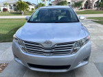 Front view of a silver 2010 Toyota Venza with 147,000 miles for sale in excellent condition.