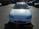 Front view of a 1995 Honda Civic EX in white with 61,000 miles, featuring sunroof and clean interior.