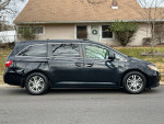 2013 Honda Odyssey EX FWD, clean black minivan with leather interior parked outside a house.
