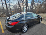 Clean 2011 Hyundai Sonata GLS FWD in pristine condition, showcasing sleek black exterior and stylish design.