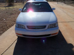 Front view of a 1997 Acura CL 2.2 FWD with 108,000 miles, showcasing its sleek design.