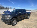 2018 Ford F-150 Platinum 4x4 truck parked, excellent condition with recent repairs and highway mileage.