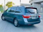 2013 Honda Odyssey EX in gray, showcasing rear view and alloy wheels, available with low mileage and clean history.
