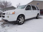 2007 Chevrolet Uplander with 137,000 miles, clean exterior, parked in the snow, ready for delivery.