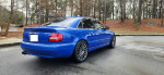 Rare 2001 Audi S4 Sedan in Nogaro Blue with black leather, showcasing its performance upgrades and sleek design.