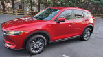 2017 Mazda CX-5 SUV in red, well maintained, featuring sunroof and leather interior, ready for new owner