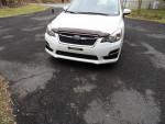 2015 Subaru Impreza in pearl white metallic, excellent condition, 111,000 miles, available for sale