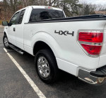 Clean 2009 Ford F-150 XLT Supercab with low mileage and 4x4, featuring chrome wheels and a bed liner.