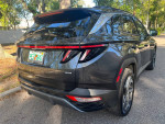 2024 Hyundai Tucson Limited AWD SUV parked with a pristine exterior under sunlight