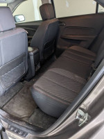 Interior view of a 2011 Chevrolet Equinox showing back seats and cabin space