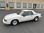 1992 Ford Mustang LX RWD with a white exterior parked outdoors, showcasing its classic design and sporty features.