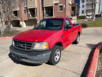 2003 Ford F-150 in red, well maintained, suitable for daily driving or work with minor cosmetic wear.