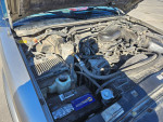 1999 Chevrolet Blazer engine view showing components and low mileage updates for sale at $2000 or best offer.