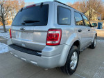 2012 Ford Escape XLT FWD in silver with clean exterior, 75,000 miles, ready for a test drive.
