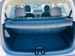Interior view of the 2015 Kia Soul's spacious trunk area with a flat storage surface.