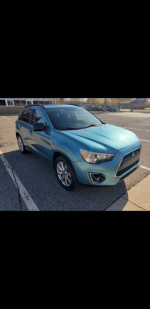 2013 Mitsubishi Outlander Sport AWD in blue with new tires and clean title for sale.