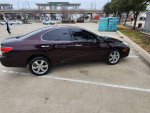 2005 Lexus ES 330 in maroon with tan interior parked, featuring sunroof and premium sound system.