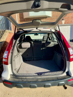 Interior view of the trunk of a 2008 Honda CR-V with ample storage space