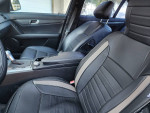Interior of a 2008 Mercedes-Benz C300 showing luxury leather seats and modern design.